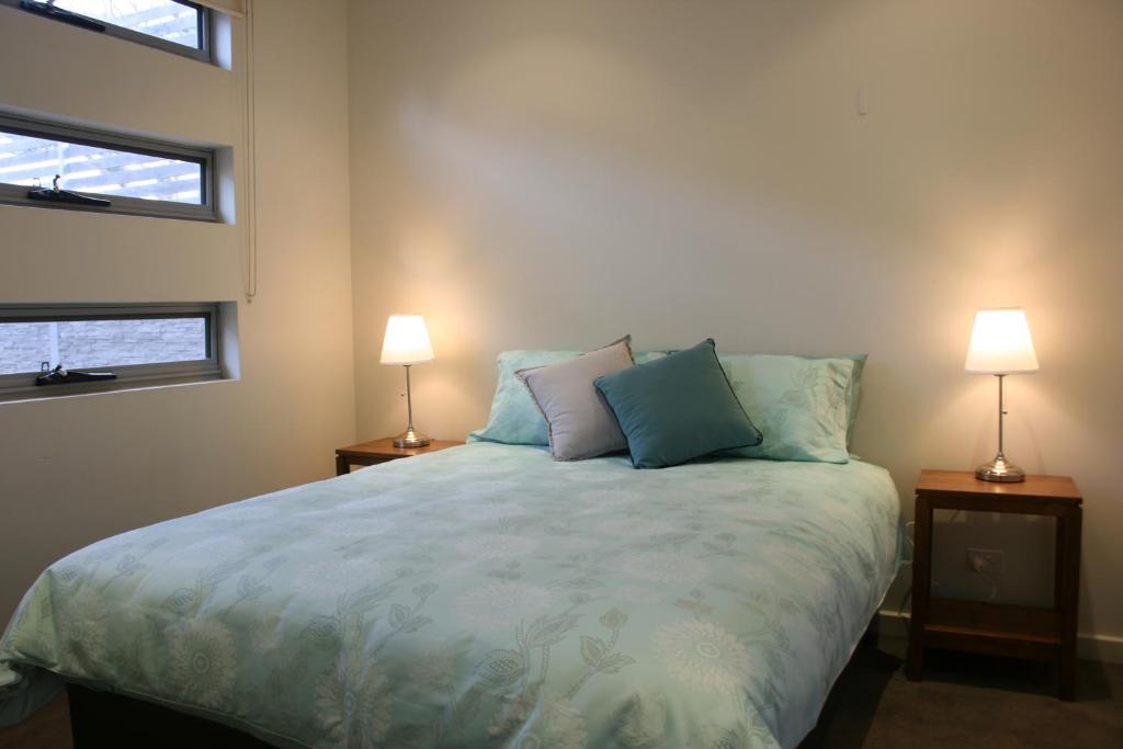 Postel nebo postele na pokoji v ubytování Penneshaw Oceanview Apartments