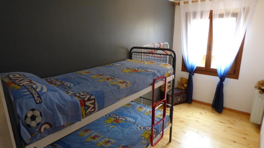 Postel nebo postele na pokoji v ubytování Parc Apartaments