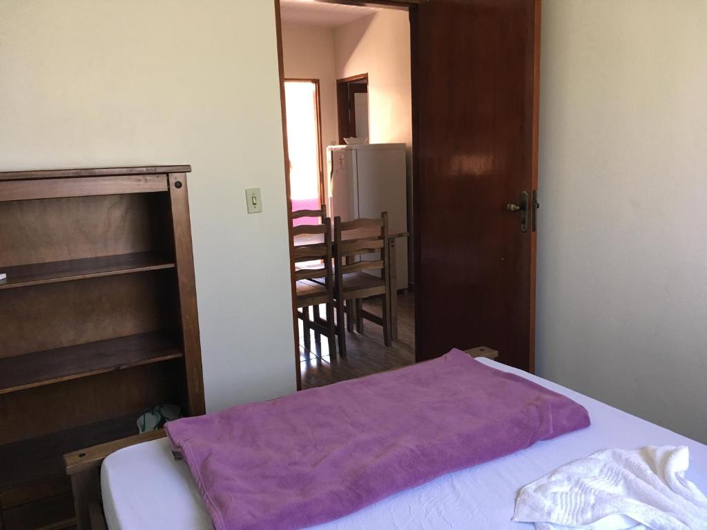 Postel nebo postele na pokoji v ubytování Flat da Pousada Avalon (Bolinha)
