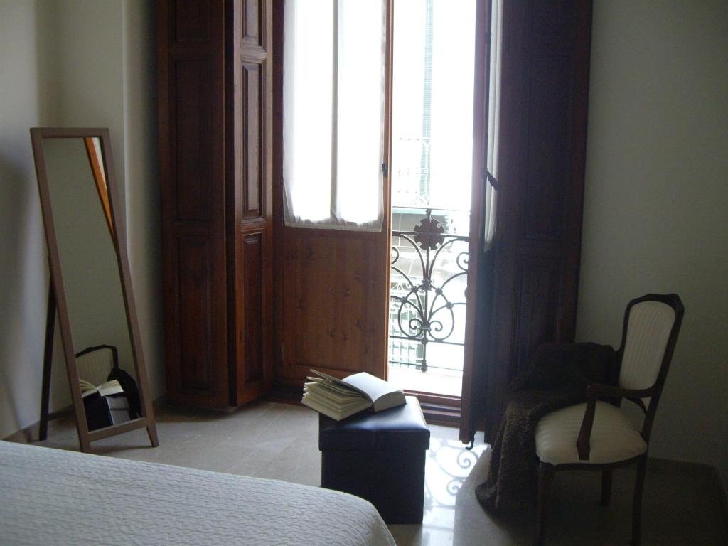 Postel nebo postele na pokoji v ubytování Hotel San Sebastián Hospedería