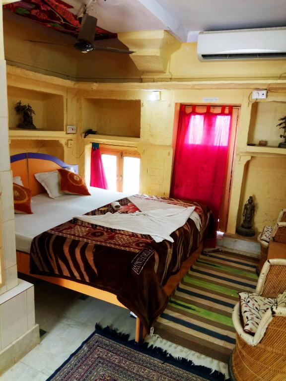 Postel nebo postele na pokoji v ubytování Hotel Paradise