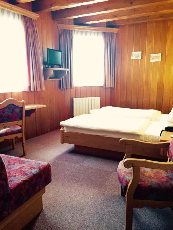 TV a/nebo společenská místnost v ubytování Hotel et Spa du Scharrach