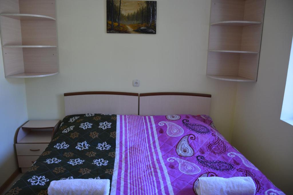 Postel nebo postele na pokoji v ubytování House in Mestia