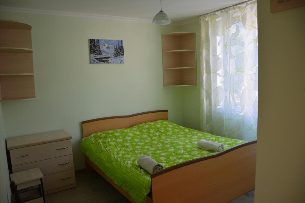 Postel nebo postele na pokoji v ubytování House in Mestia