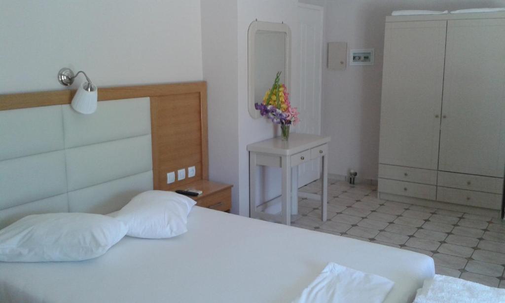 Posteľ alebo postele v izbe v ubytovaní Lydia Rooms & Studios