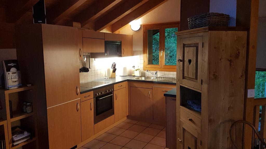 Köök või kööginurk majutusasutuses Chalet Chaperon Rouge