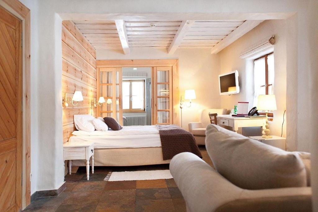 Posteľ alebo postele v izbe v ubytovaní Osada Głęboczek. Vine Resort&Spa