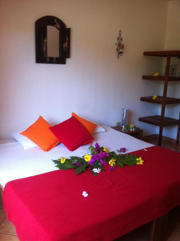 Postel nebo postele na pokoji v ubytování Hotel Laguna del Cocodrilo