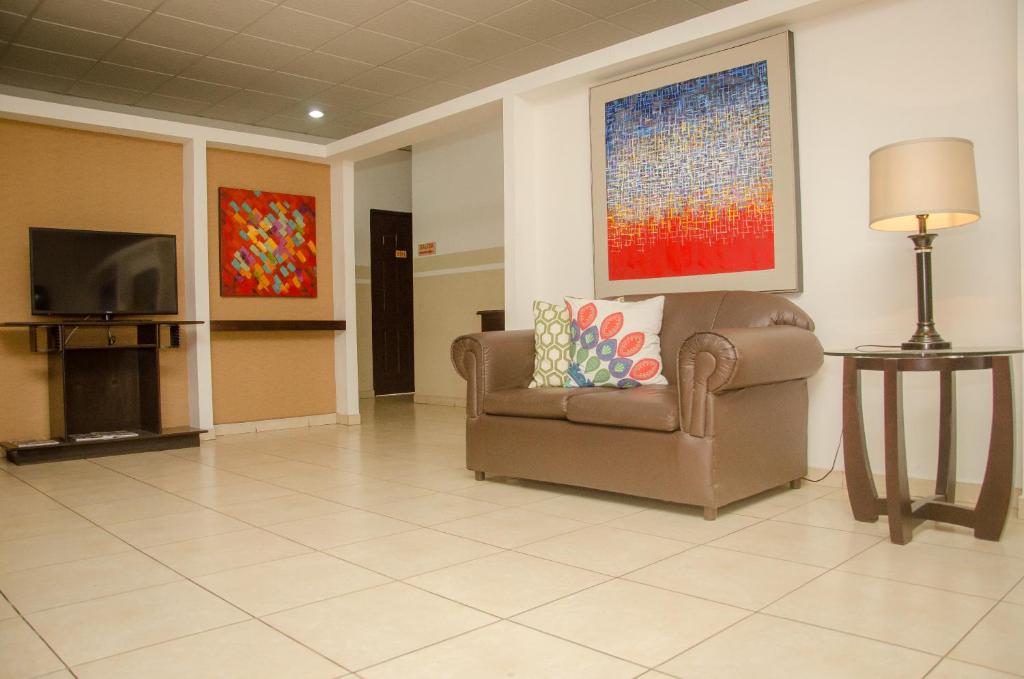 TV a/nebo společenská místnost v ubytování Hotel Residencial Cervantes
