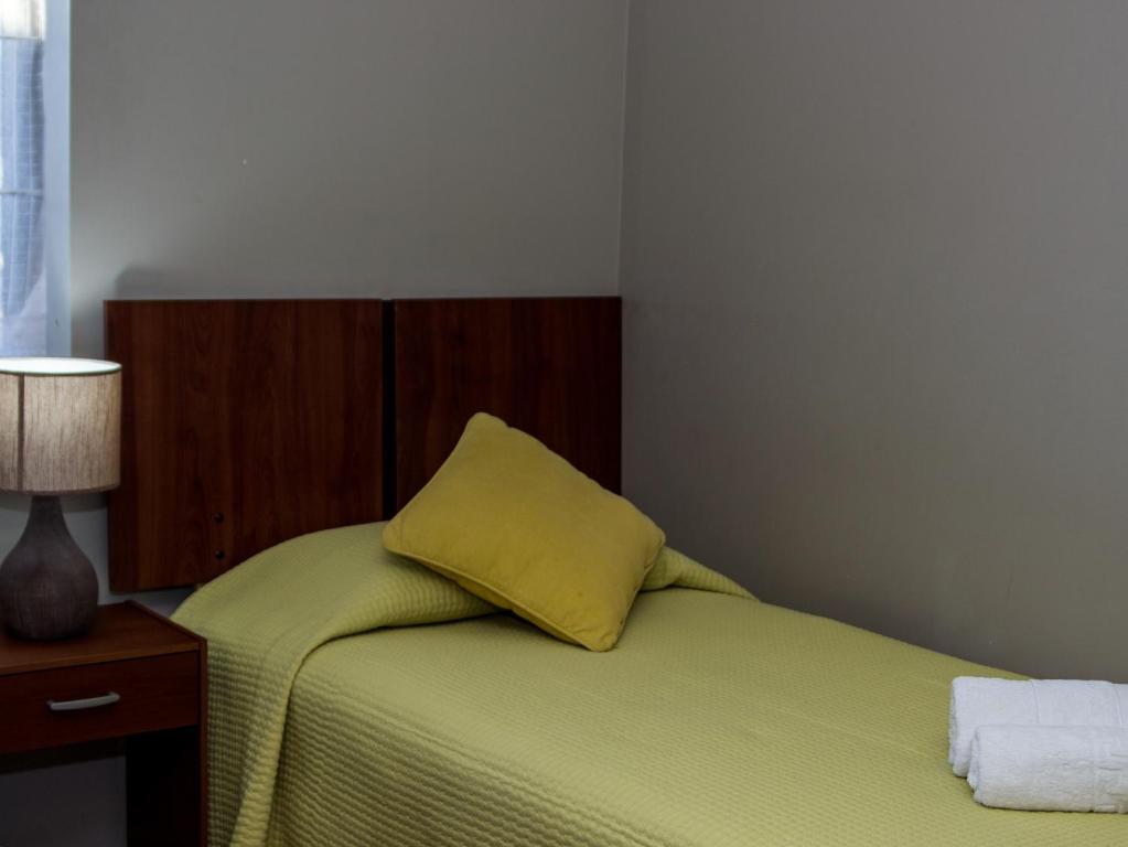 Postel nebo postele na pokoji v ubytování 914 Hotel