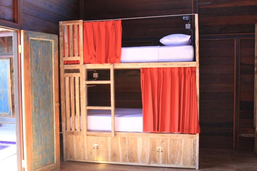 Postel nebo postele na pokoji v ubytování The Tipsy Gypsy Hostel