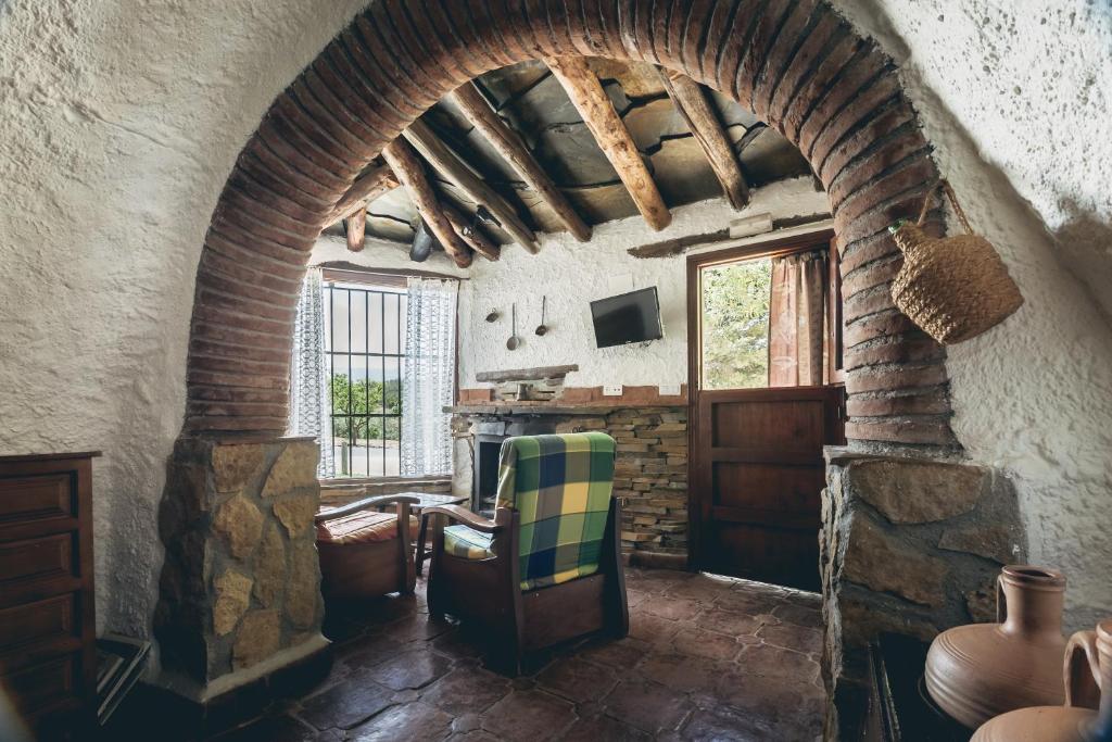 Posezení v ubytování Casas Cueva Tio Tobas Guadix