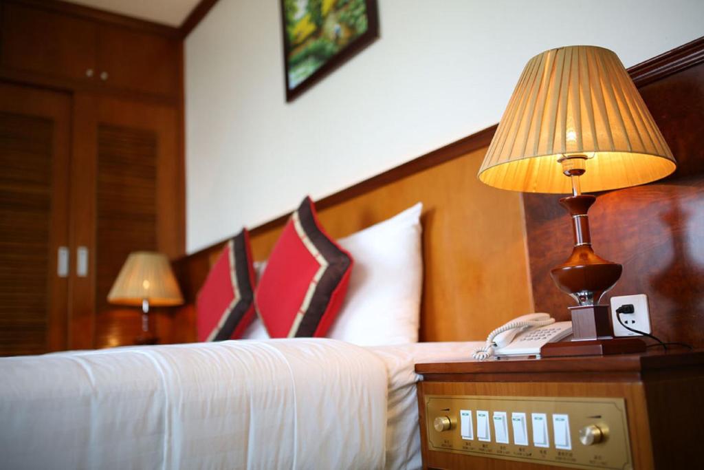 Postel nebo postele na pokoji v ubytování Sunny Hotel 1