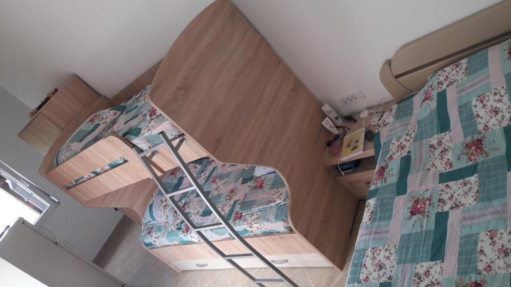 Krevet ili kreveti u jedinici u okviru objekta Apartmani "Ravić"