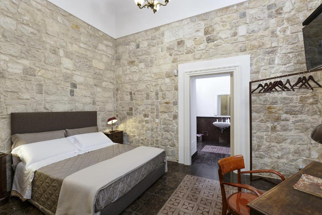 Postel nebo postele na pokoji v ubytování Edel Modica