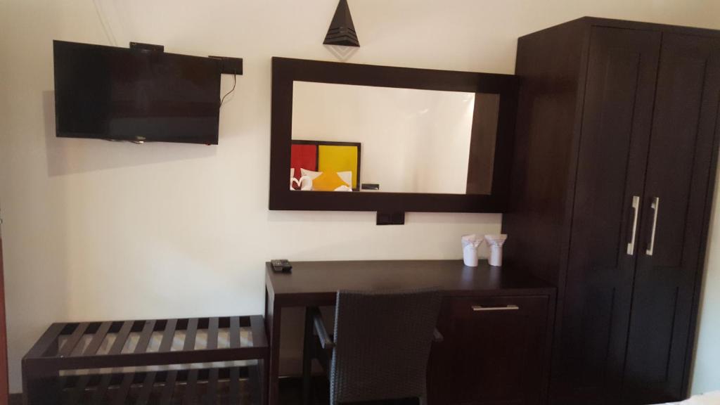 TV a/nebo společenská místnost v ubytování Sigiri Resort
