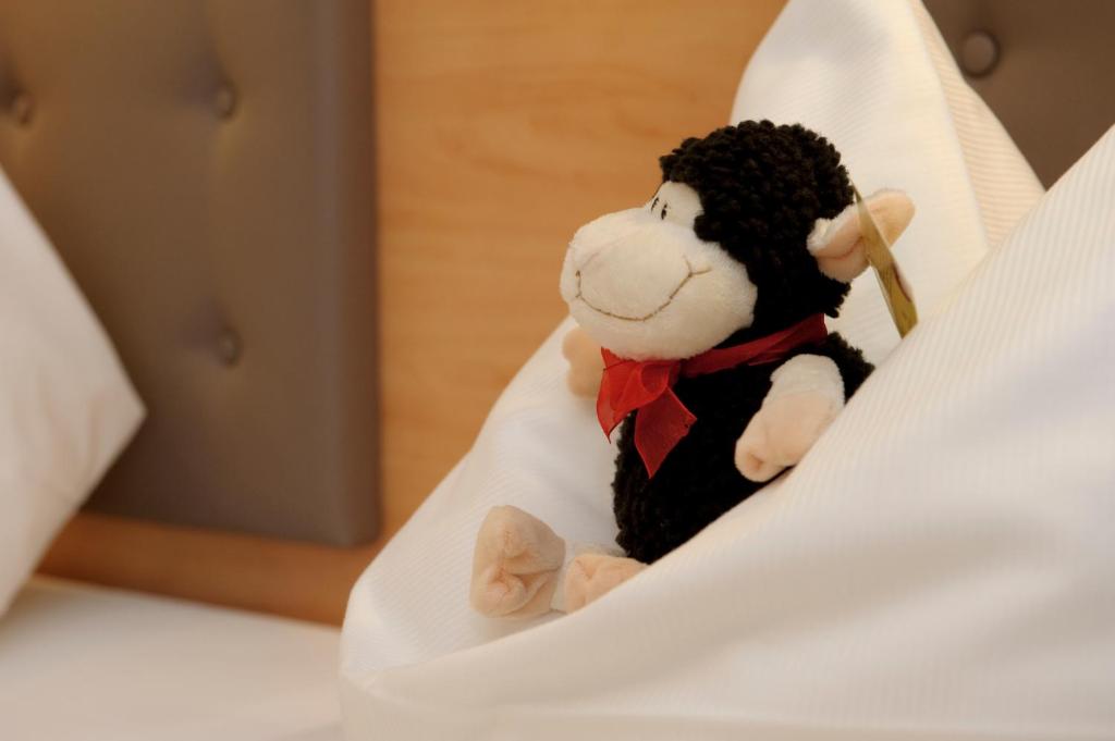Postel nebo postele na pokoji v ubytování Land-gut-Hotel Hotel Adlerbräu