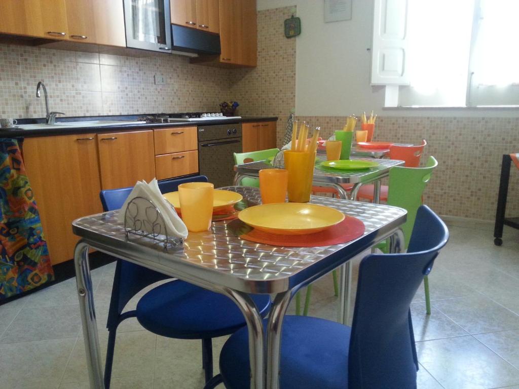 Kuchyň nebo kuchyňský kout v ubytování CASA Melone Giallo