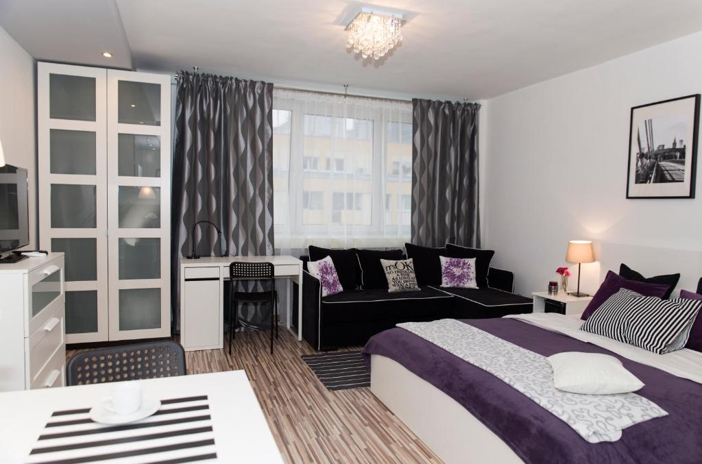 Posteľ alebo postele v izbe v ubytovaní Warsawrent Hit Apartments