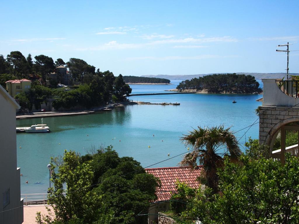 a view of a river with boats in it at Apartments Dora in Banjol