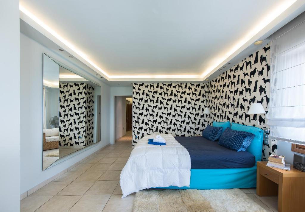 En eller flere senge i et værelse på #Luxlikehome-Cosmopolitan Maison