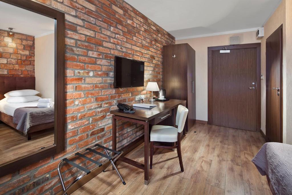 TV a/nebo společenská místnost v ubytování Hotel Bonum Old Town