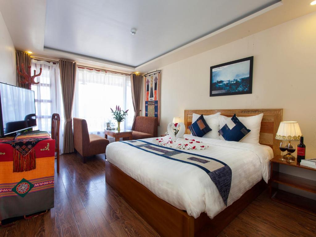 Giường trong phòng chung tại Sapa Centre Hotel