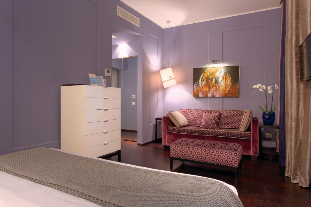 Letto o letti in una camera di Stendhal Luxury Suites
