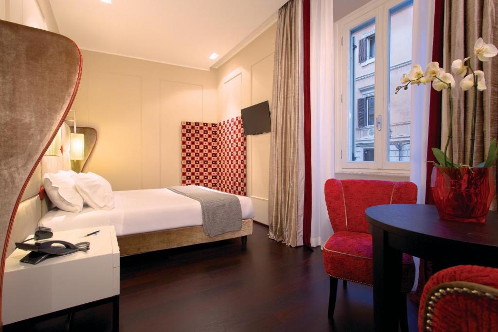 Letto o letti in una camera di Stendhal Luxury Suites