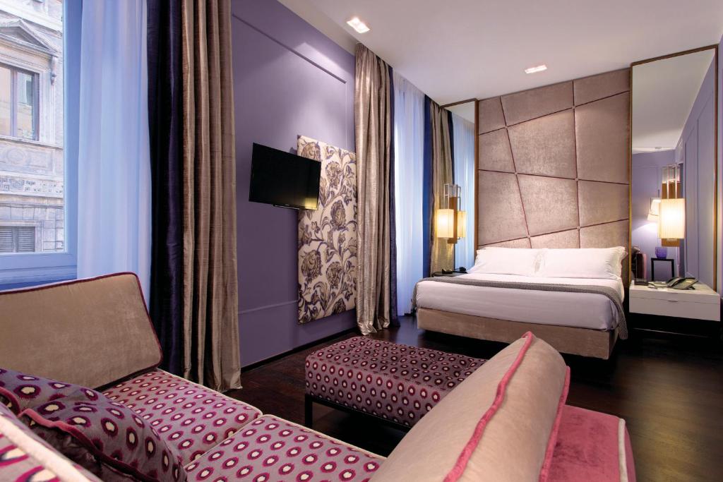 Letto o letti in una camera di Stendhal Luxury Suites