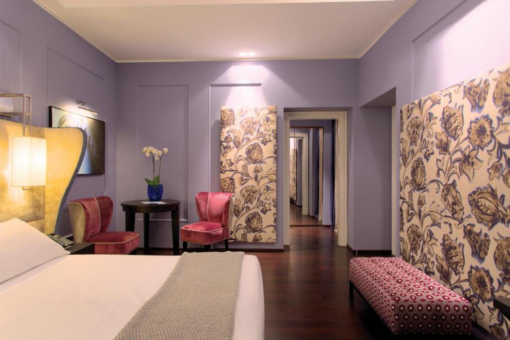 Letto o letti in una camera di Stendhal Luxury Suites