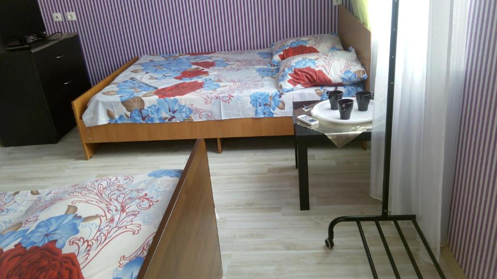 Krevet ili kreveti u jedinici u okviru objekta Guest House on Abazgaa 30