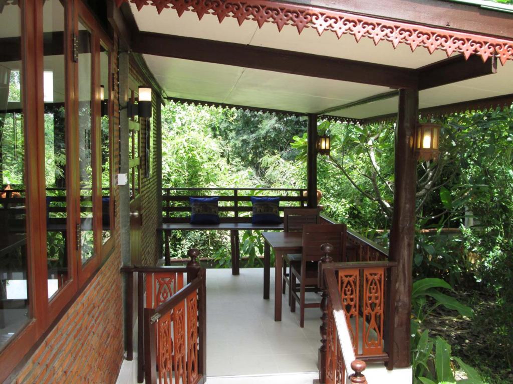 Balkón nebo terasa v ubytování Happiness Resort Sukhothai