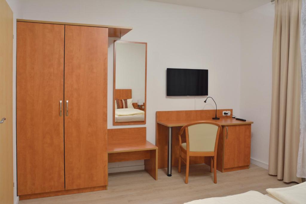 TV a/nebo společenská místnost v ubytování Boutique Hotel Wolfsburg