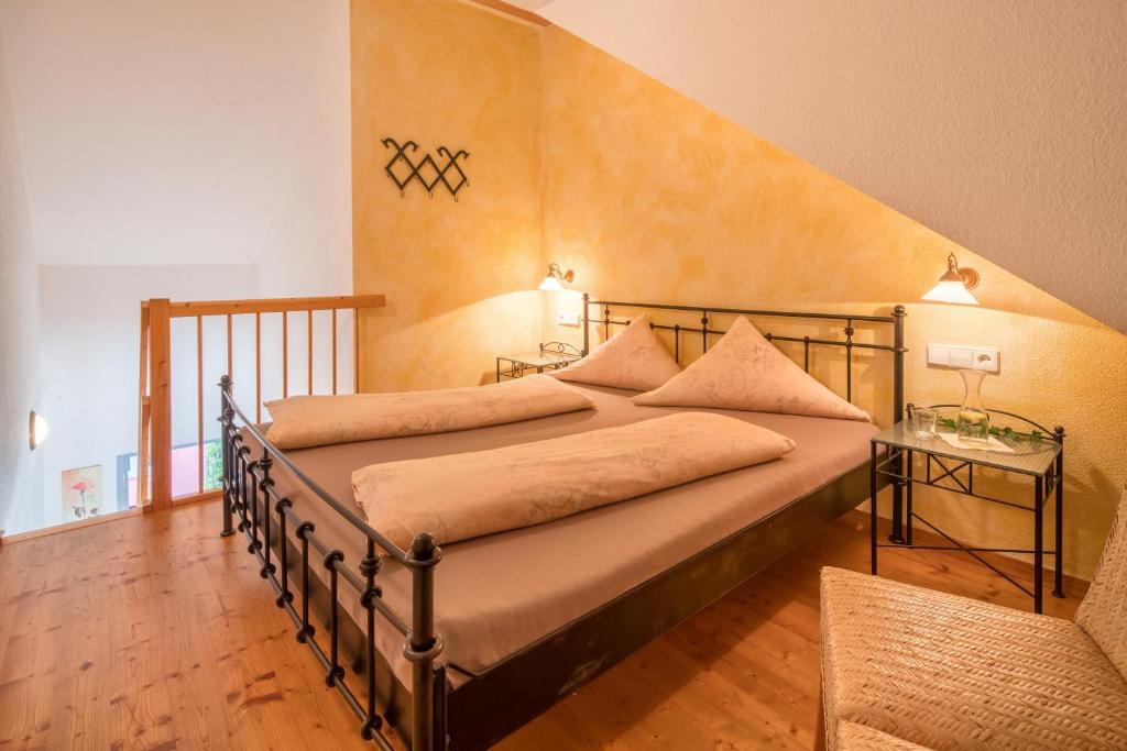 Postel nebo postele na pokoji v ubytování Arndt Hotel Garni