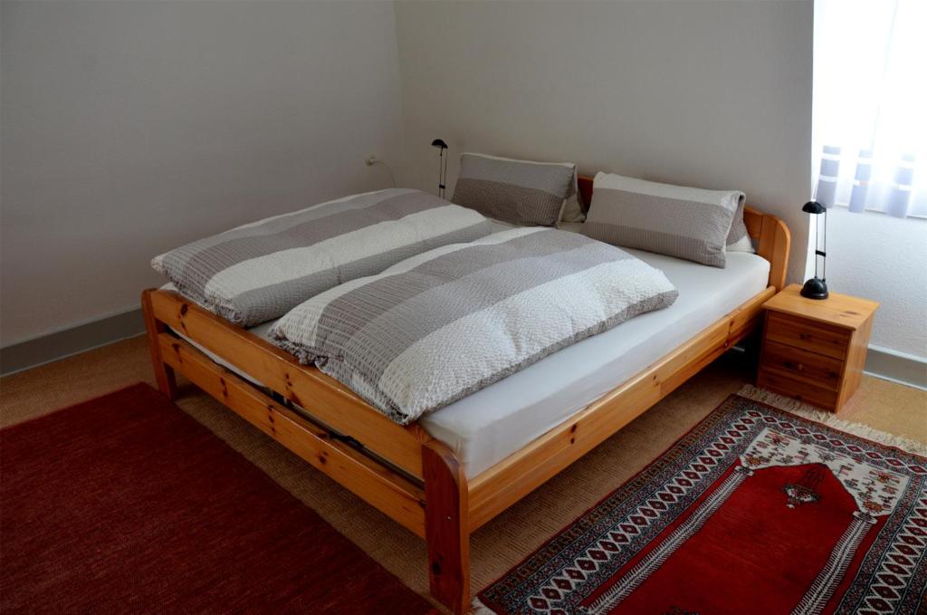 Postel nebo postele na pokoji v ubytování Villa Am Rosenfelspark
