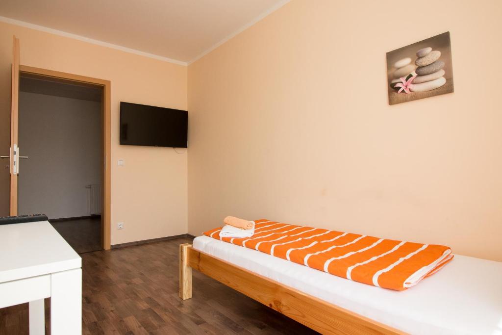 Postel nebo postele na pokoji v ubytování City Apartments Herne