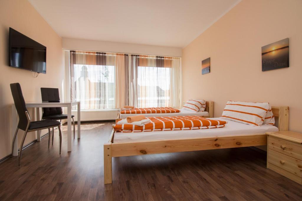 Postel nebo postele na pokoji v ubytování City Apartments Herne