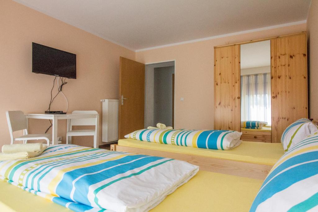 Postel nebo postele na pokoji v ubytování City Apartments Herne