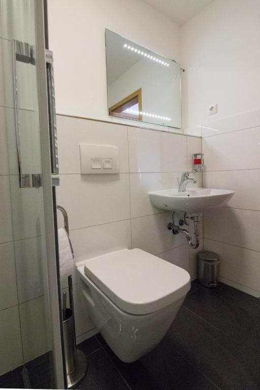Koupelna v ubytování City Apartments Herne