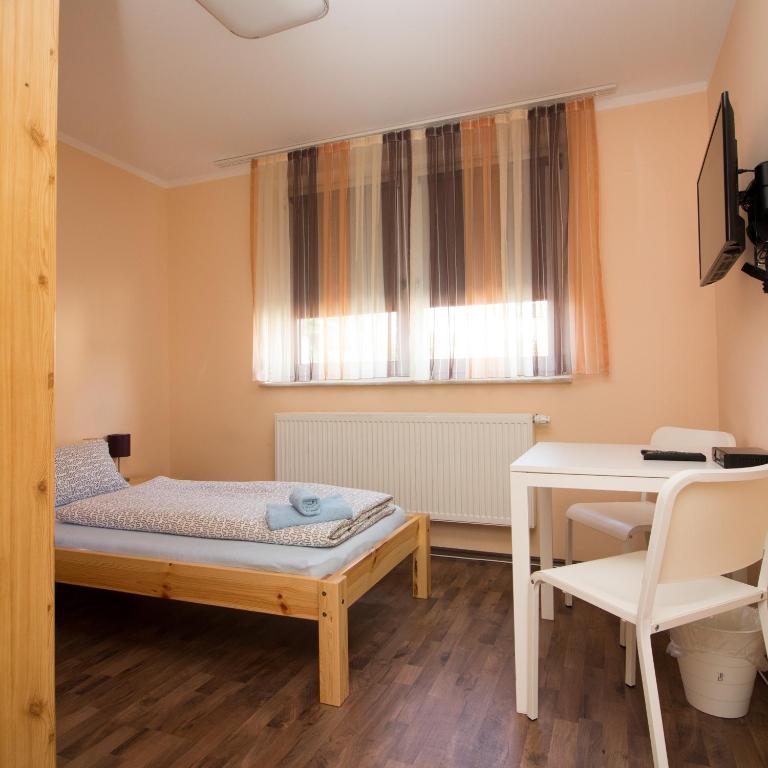 Postel nebo postele na pokoji v ubytování City Apartments Herne