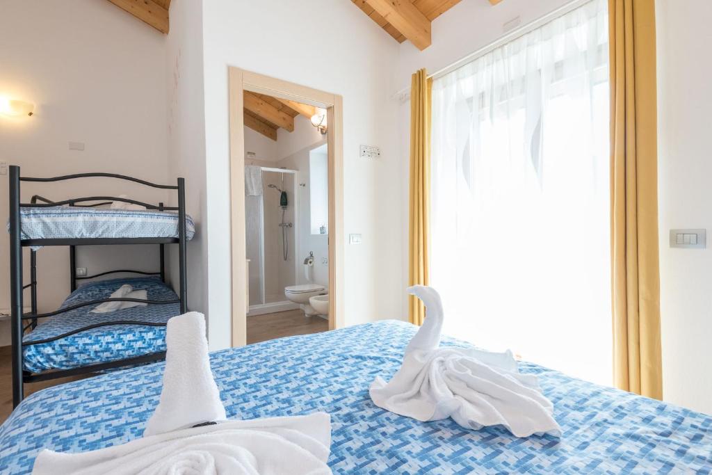 Postel nebo postele na pokoji v ubytování TeglioVacanze
