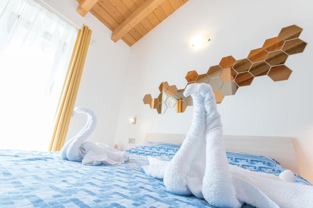 Postel nebo postele na pokoji v ubytování TeglioVacanze
