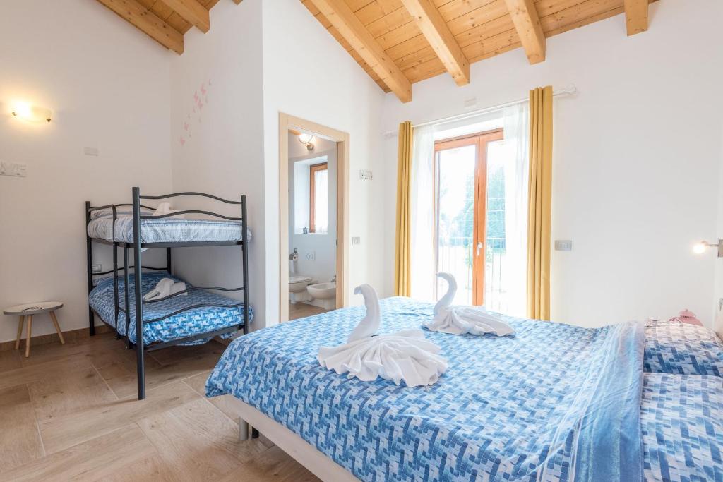 Postel nebo postele na pokoji v ubytování TeglioVacanze