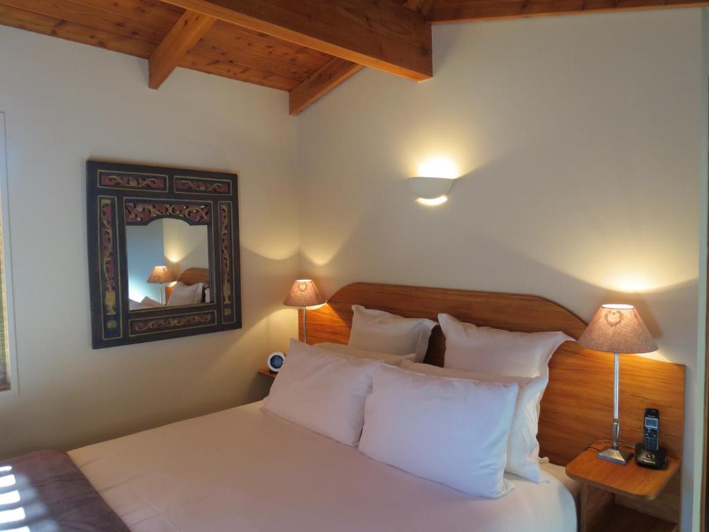 Postel nebo postele na pokoji v ubytování Te Wanaka Lodge