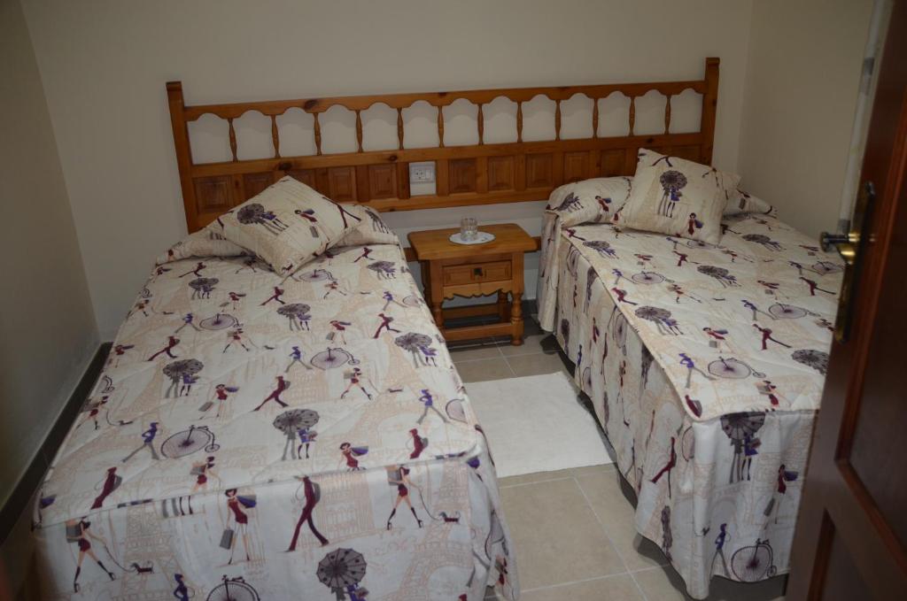 Postel nebo postele na pokoji v ubytování Casa Camilo