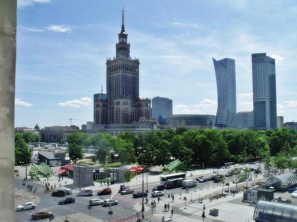 a view of a city with a tall building at Coser Apartamenty Centrum 1 in Warsaw