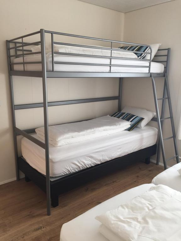 Postel nebo postele na pokoji v ubytování Steinn Farm Private Apartment