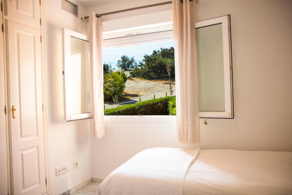 Säng eller sängar i ett rum på Manilva Beach 140