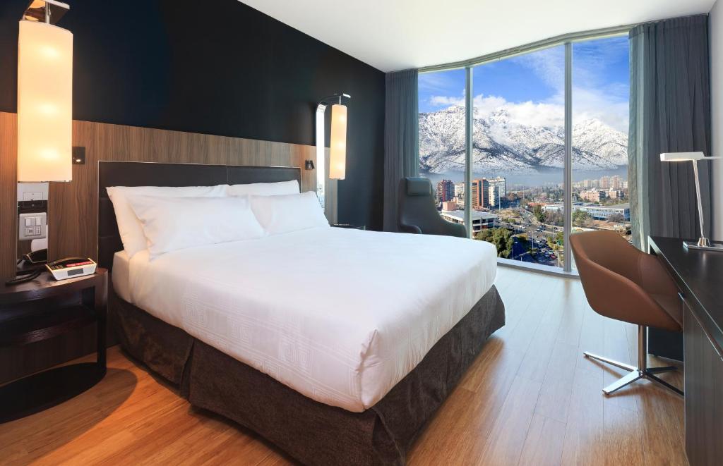 Postel nebo postele na pokoji v ubytování Icon Hotel